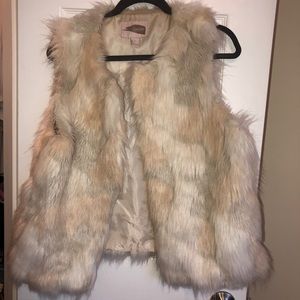 White furry vest